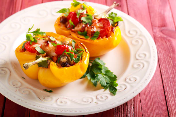 istock pepper stuffed with chicken fillet, tomato and cheese 1048041092