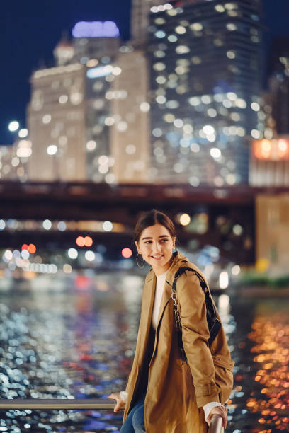 istock woman walking near Chicago river 1048046752