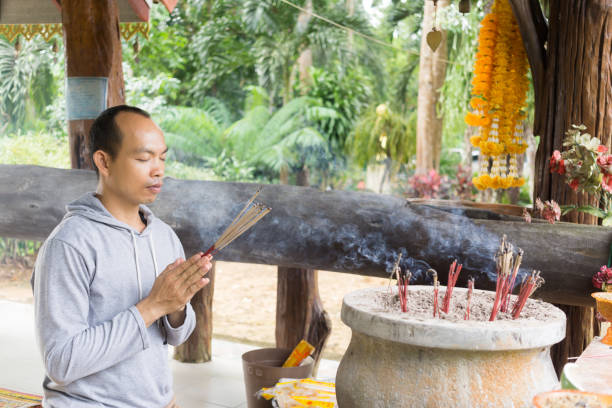 istock The Asian man pay respect to the Buddha 1048054558