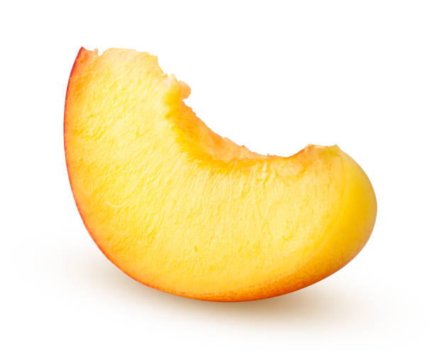 istock Nectarine or peach, slice, isolated on white background, clipping path, full depth of field 1048054624