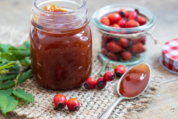 a glass with rose hip marmelade stock photo