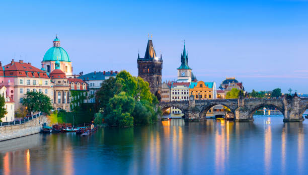 istock The Charles Bridge in Prague at Twilight, Czech Republic 1048068984