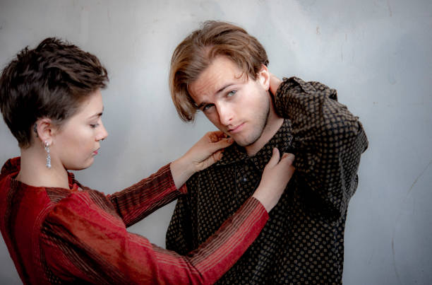 istock young lovers share a moment before going out for the evening. 1048079392