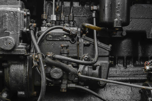 istock Background surface of old, black and oily machine engine 1048079542