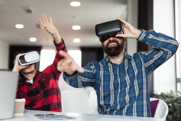 istock Virtual reality, digital office technology. Creative headset. Startup business team 1048083460
