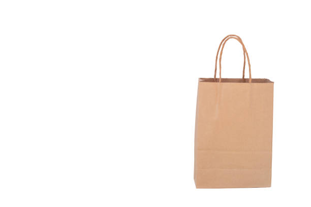 istock Brown paper bag isolated on white background. 1048084628