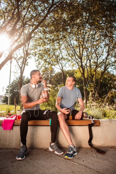 istock Friends resting after running 1048084664