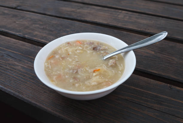 istock Bowl of soup on a table. 1048087808