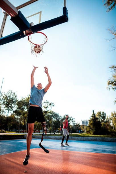 istock Friends playing basketball 1048088262