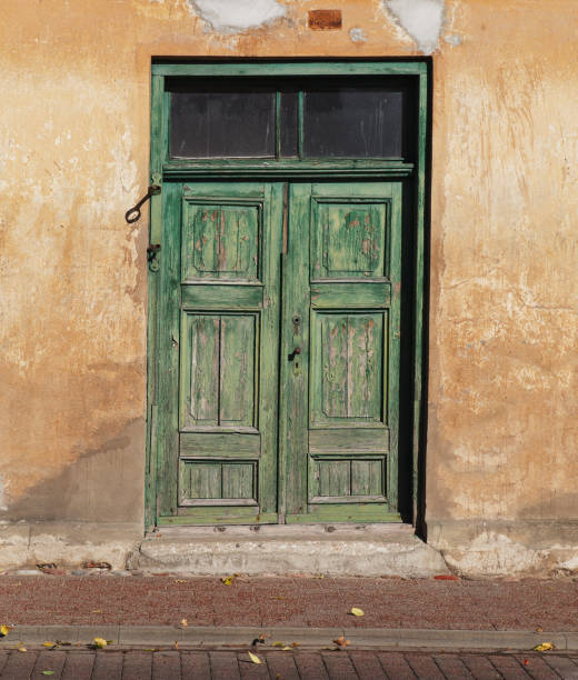 istock Wooden green door. 1048090014