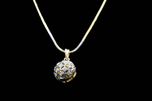 istock Fancy American diamond Chain and Pendant closeup macro image on black background 1048090346
