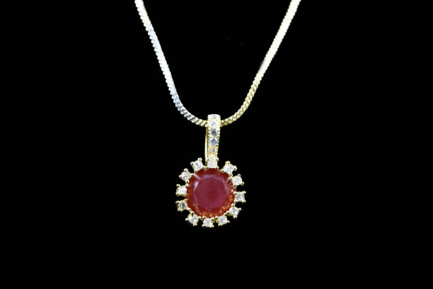 istock Fancy American diamond Chain and Pendant closeup macro image on black background 1048093516
