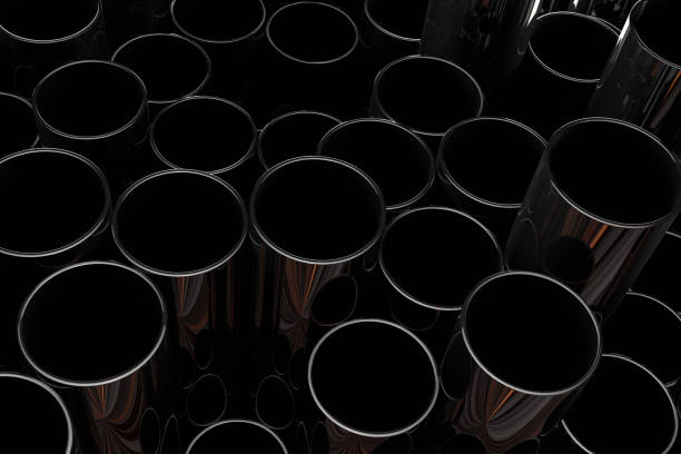 istock Stack of shiny metal steel pipes with flame 1048094488