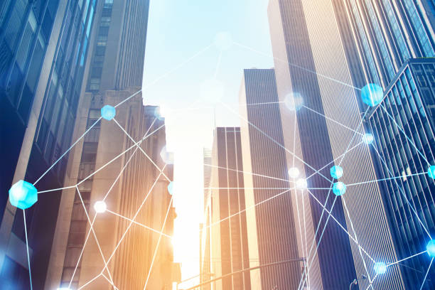 istock Modern cityscape and network hologram 1048102568