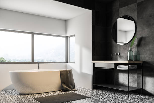 istock White and black bathroom corner, tub and sink 1048103250