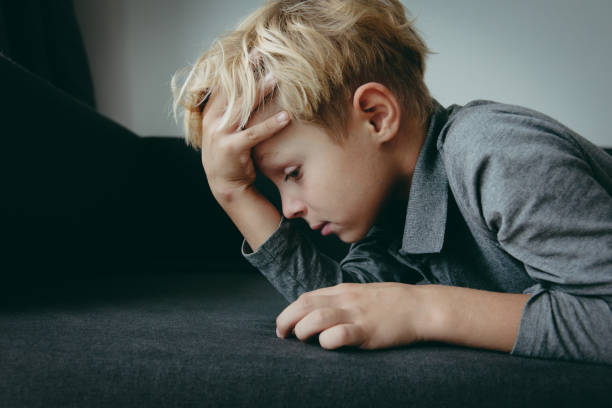 istock sad tired child stress and depression, overload, anxiety 1048108160