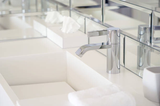 Modern white bathroom sink with faucet