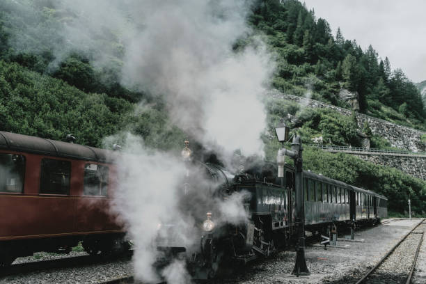 istock Old-fashioned steam train in Swiss Alps 1048113524