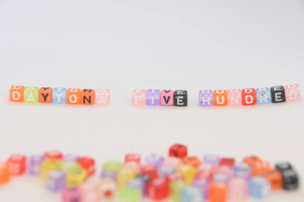 istock Word DAYTON FIVE HUNDRED made of letter cubes 1048119248