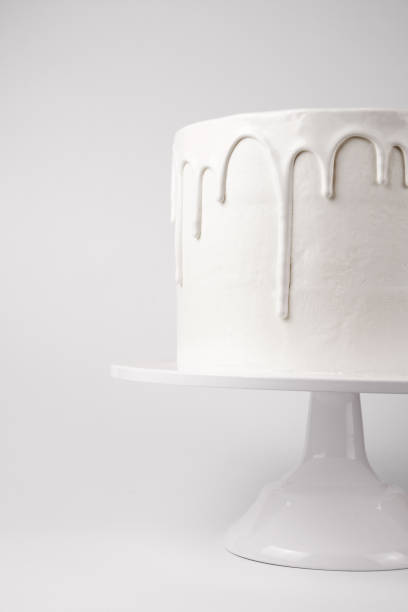 istock White cake with glaze on a white background. 1048119976