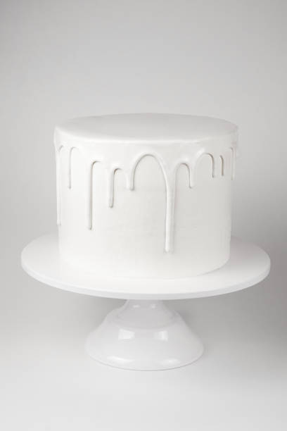 istock White cake with glaze on a white background. 1048120004