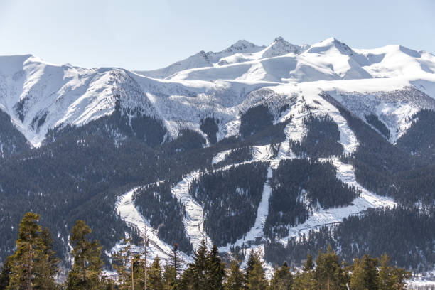 istock Skiing high up in the mountains in Russia 1048120800
