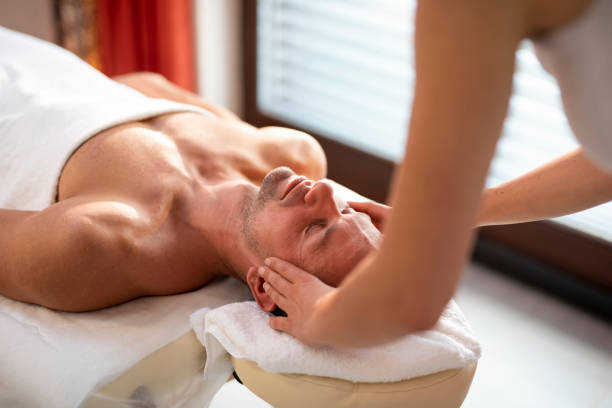 istock Man being massaged by a massage therapist 1048121304