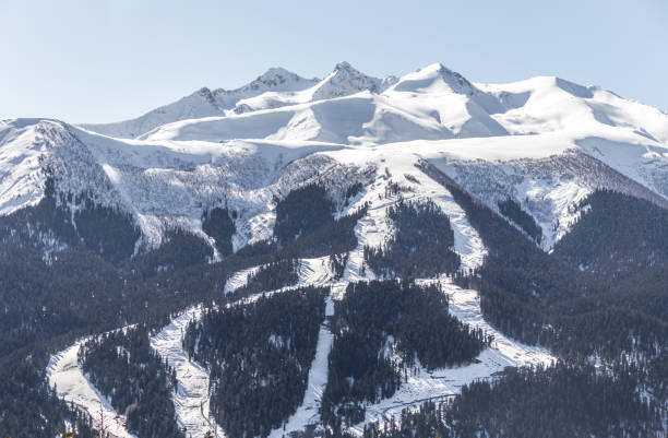 istock Skiing high up in the mountains in Russia 1048121936