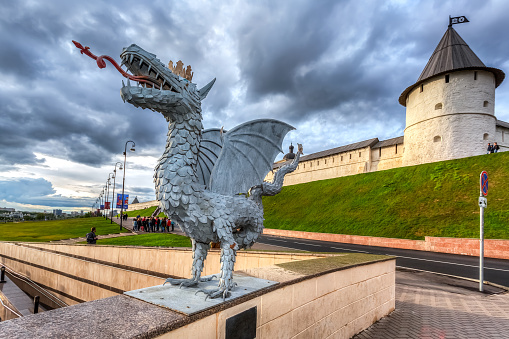 Kazan, Russia - June 10, 2018: Sculpture of mythical serpent Zilant, the official symbol of Kazan near the Kazan Kremlin and Kul Sharif mosque, the Republic of Tatarstan