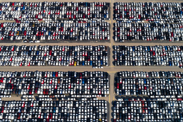istock Distribution yard with new cars of different brands 1048125770