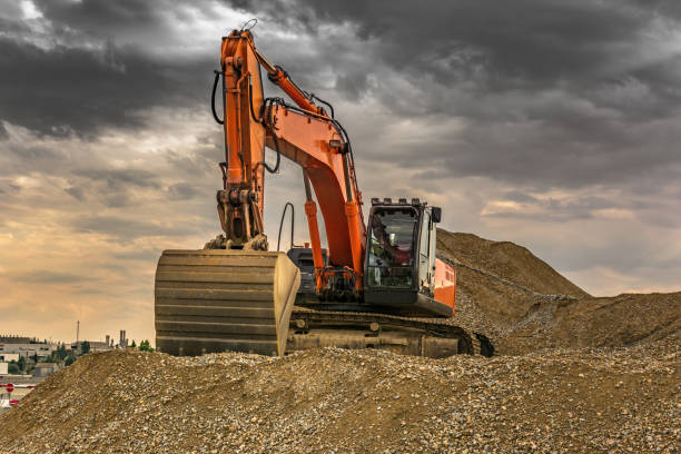 istock Excavator for gravel movement in a surface mine 1048128852