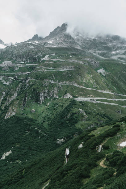 istock Old-fashioned steam train in Swiss Alps 1048131326