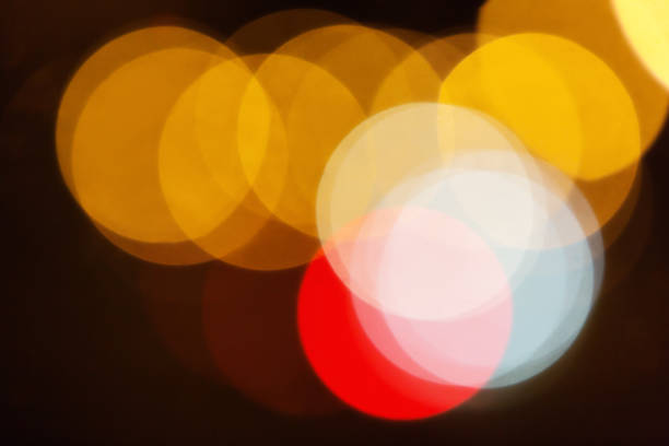 istock Red, golden, and white defocused lights as background 1048136638