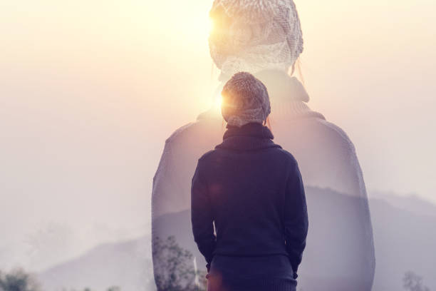 Double exposure, Woman in mountains with sunrise and sunlight effect, Rear view Double exposure, Woman in mountains with sunrise and sunlight effect, Rear view walking loneliness one person journey stock pictures, royalty-free photos & images