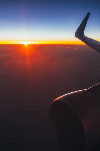 istock Beautiful sunset. Aerial view from airplane window 1048144110
