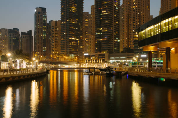 istock Beautiful view to Dubai Marina Promenade, UAE. Long exposure effect at night 1048146832