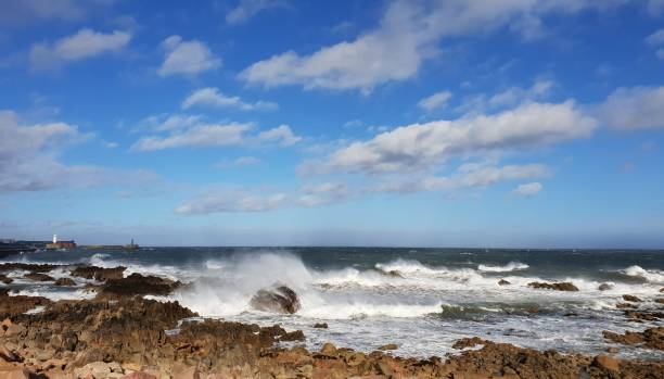istock Clouds over sea and coastline 1048154426