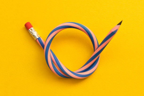 istock Flexible pencil . Isolated on yellow background 1048156488