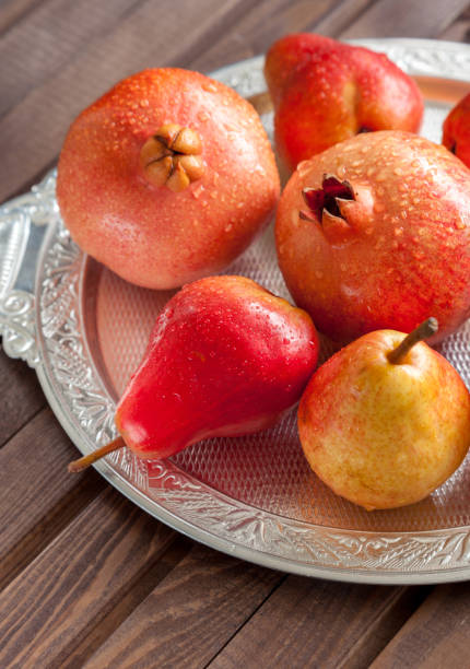 istock Different kind of fruits on a wooden table 1048160498