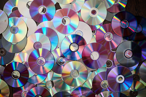 DVD and CD background. Old information disks
