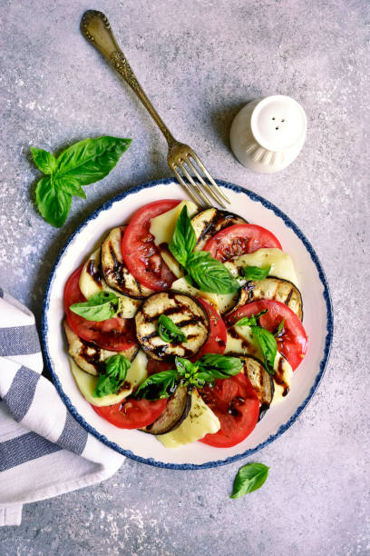 istock Italian salad caprese with eggplants 1048178966