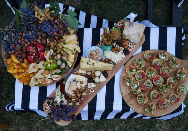 istock Holiday party outdoors picnic with food table 1048183846