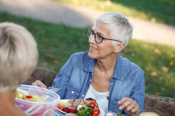 istock Senior people having a picnic 1048187538