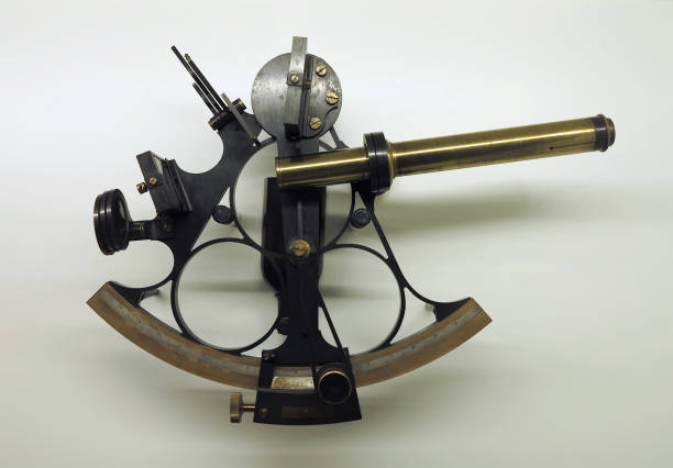istock Ancient bronze navigation sextant Astrolabe on white background 1048189578