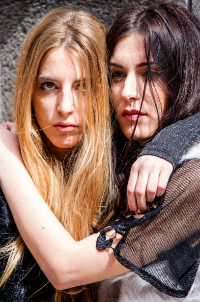istock Nice young hipster models are hugging and posing on the street. 1048194996