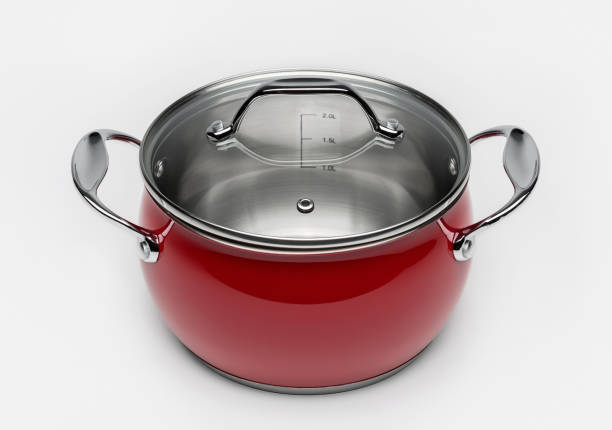 istock Metallic red cooking pan with glass lid isolated on white background 1048203364
