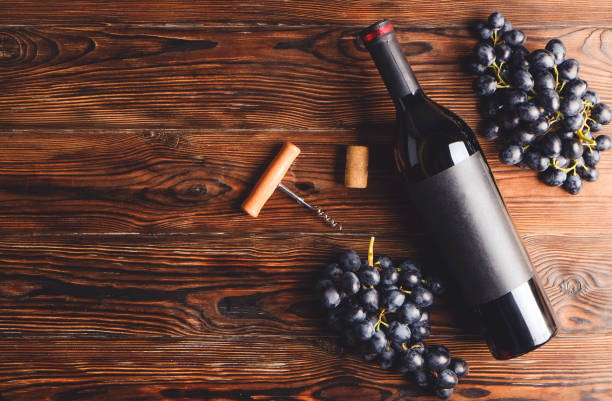 istock Showcase of vintage wine bottles with empty sticker labels. 1048203450