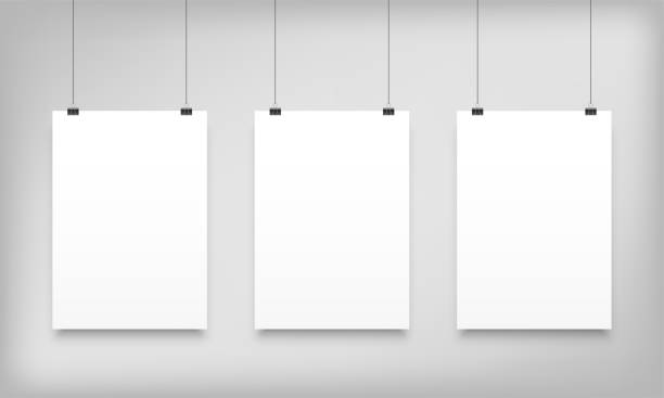 Poster mockups hanging. Vector white paper canvas posters or A4 photo frames templates Poster mockups hanging. Vector white paper canvas posters or A4 photo frames templates portfolio photos stock illustrations