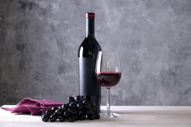 istock Showcase of vintage wine bottles with empty sticker labels. 1048204136