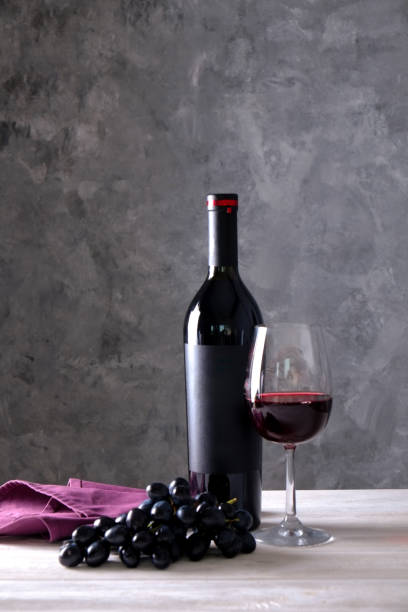istock Showcase of vintage wine bottles with empty sticker labels. 1048204164